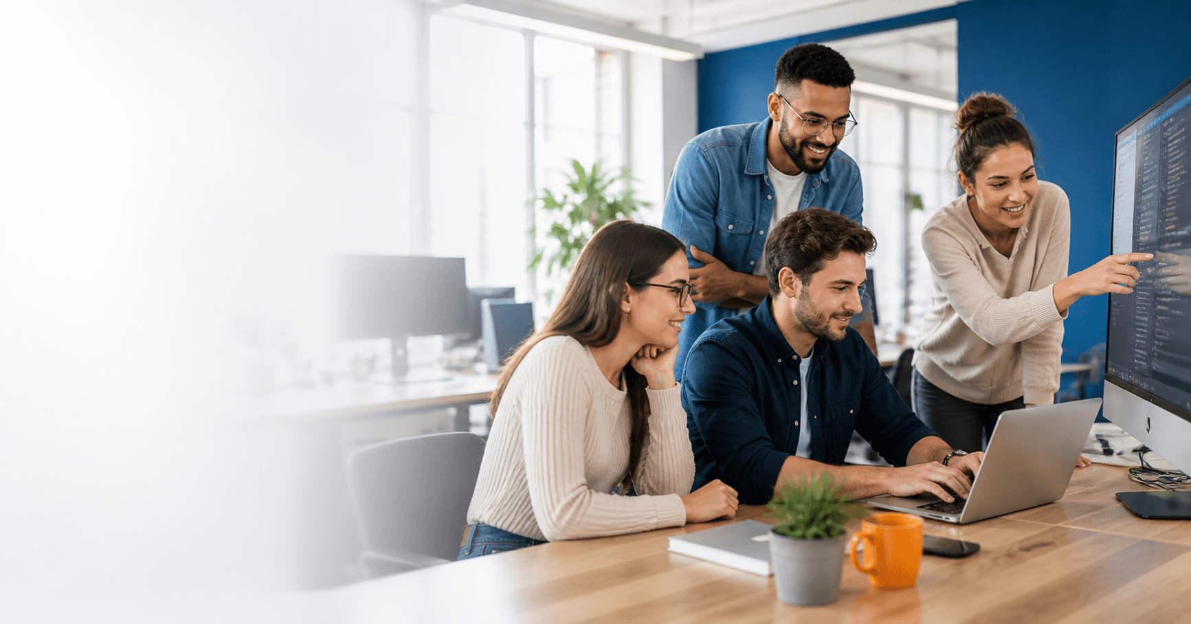 Software product and engineering team collaborating in a technology office
